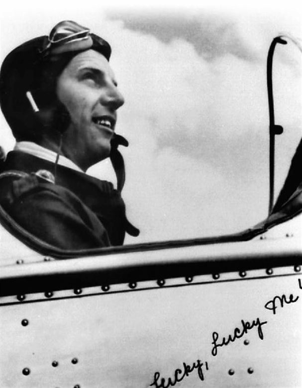 Picture of 2nd Lt. George Whiteman in the cockpit of his training aircraft. The photo is taken from a postcard Lt. Whiteman sent his sister upon graduation from flight school in 1940.