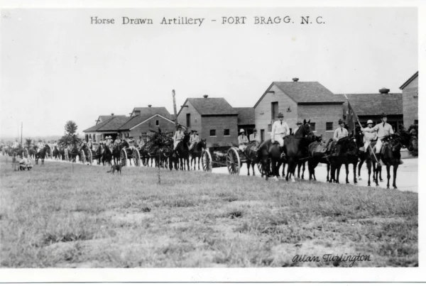 Horse-drawn artillery parade at Fort Bragg, N.C. Military Lawyers at Fort Bragg at The Law Office of Will M. Helixon, committed to protecting soldiers’ rights during investigations.