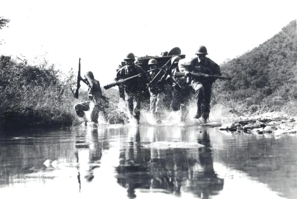 Soldiers from 1st Armored Brigade Combat Team, 2nd Infantry Division, run through water during training in South Korea