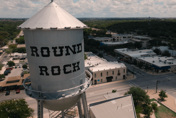 Aerial view of the historic Round Rock water tower and downtown Round Rock Texas