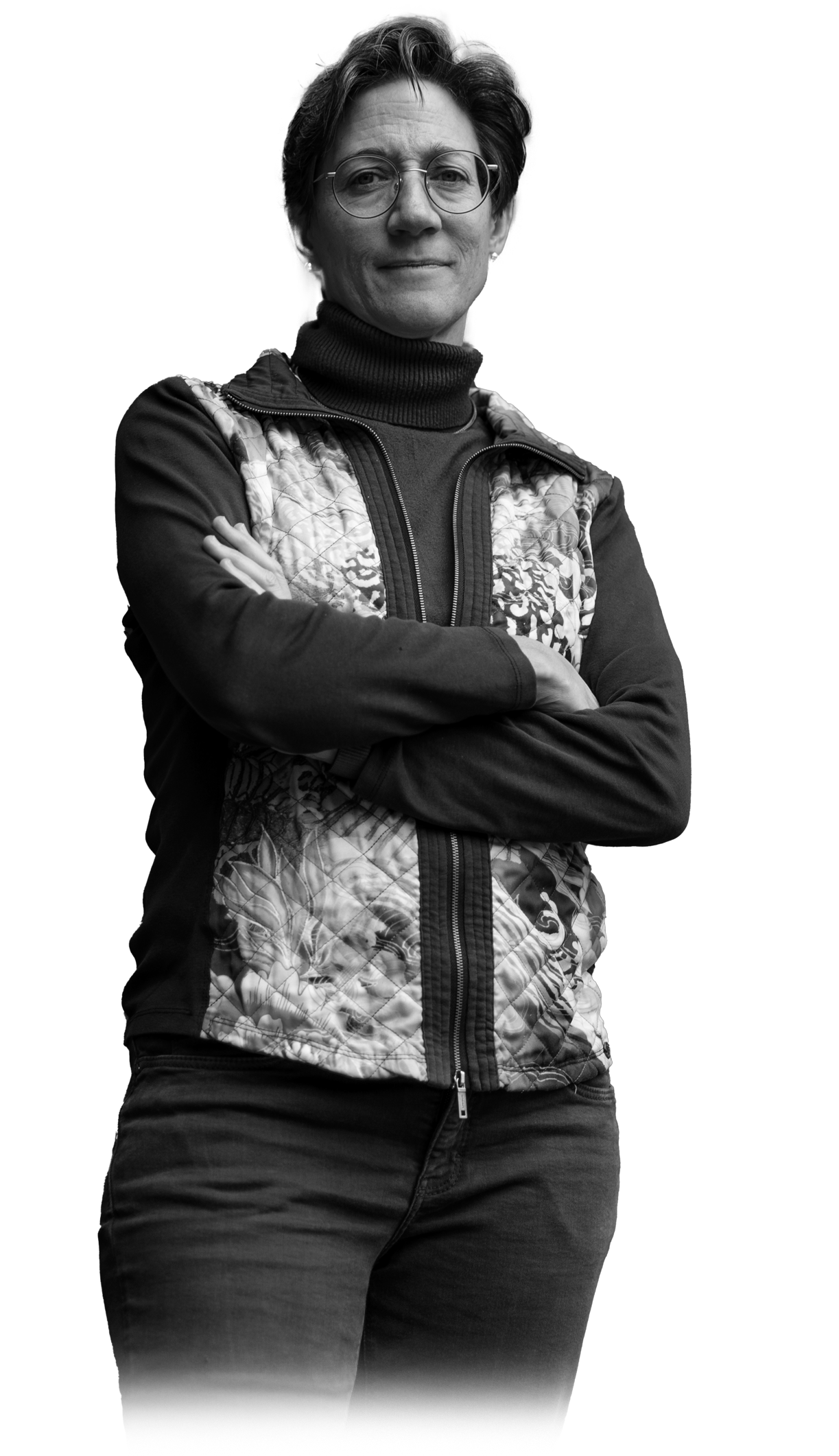 Mary Ritzmann black and white cut out portrait with arms crossed and faded lower edge