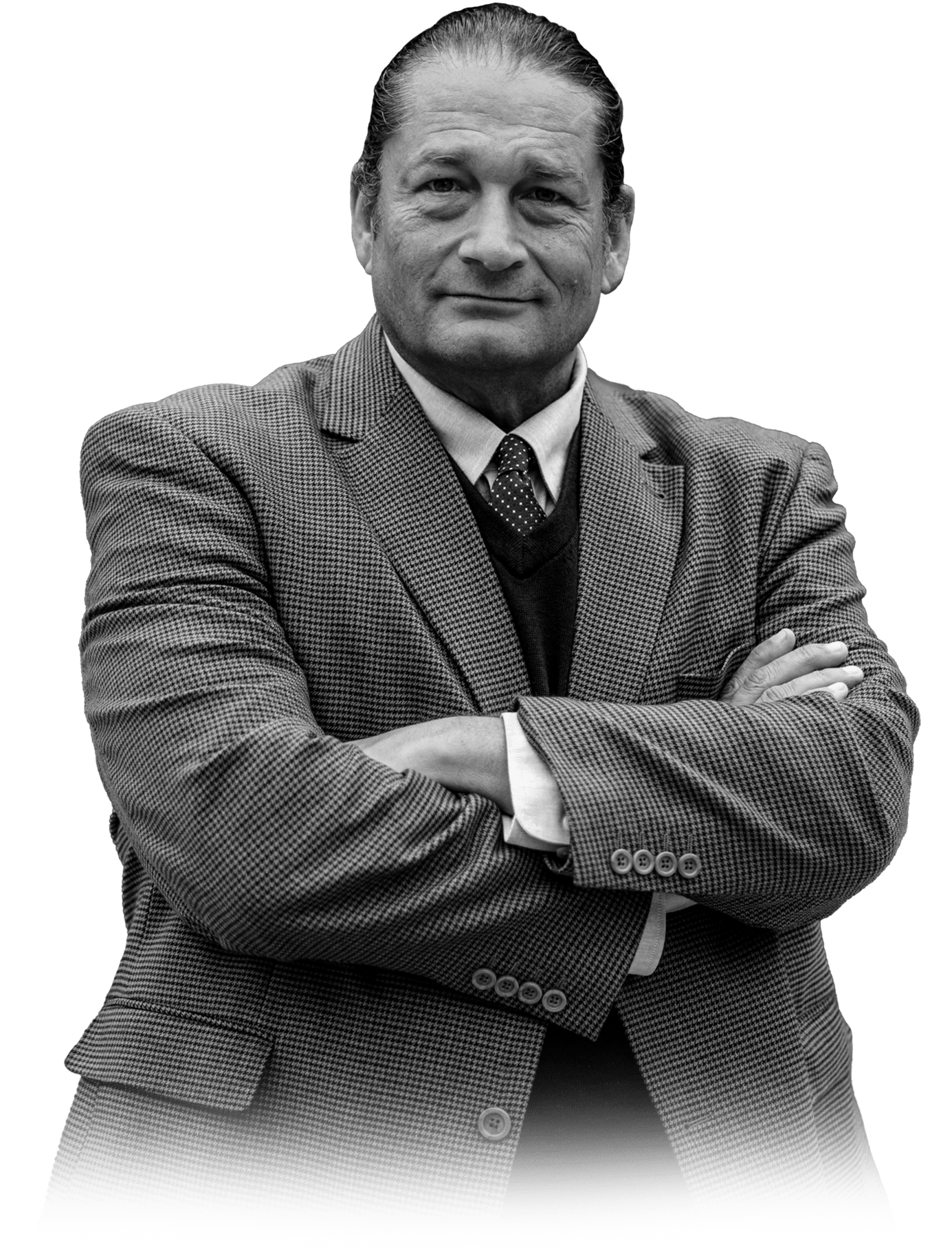 Will M. Helixon, Founder of the Law Office of Will M. Helixon, wearing a suit and tie, arms crossed