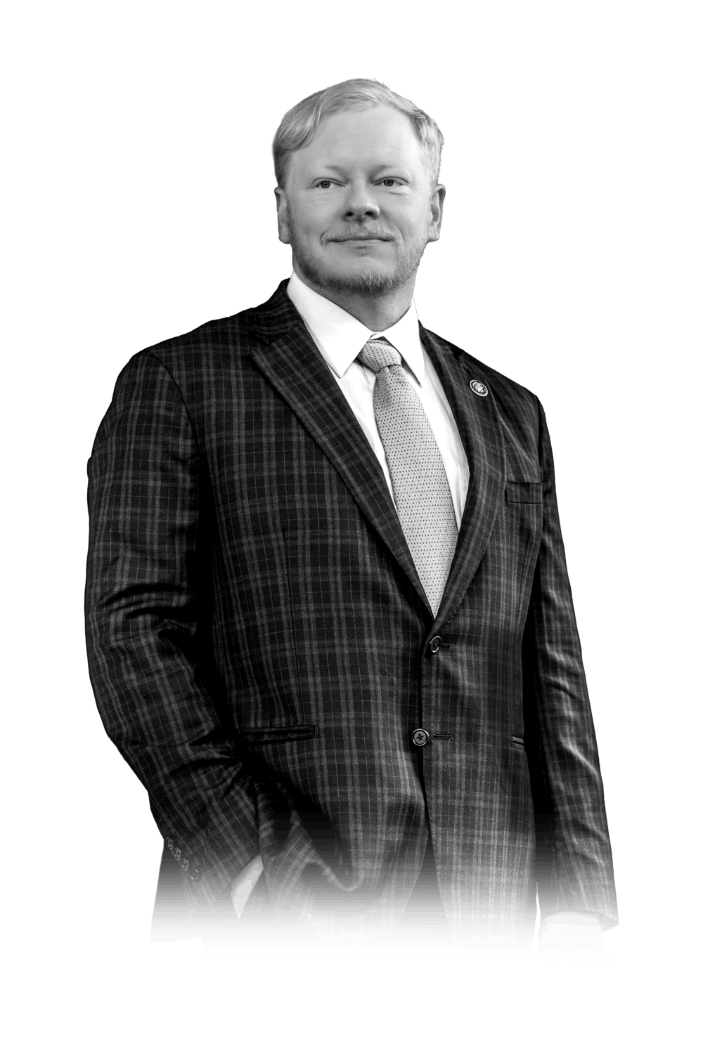 Black and white portrait of military defense attorney Cadman R. Kiker in a suit and tie
