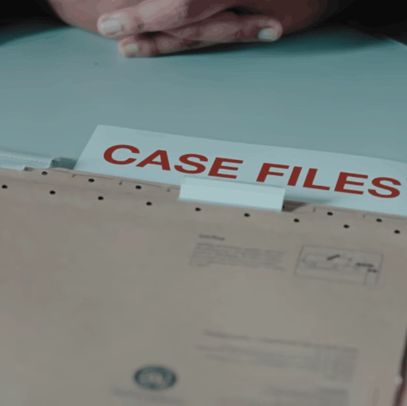 Case file folder labeled "CASE FILES" on a table