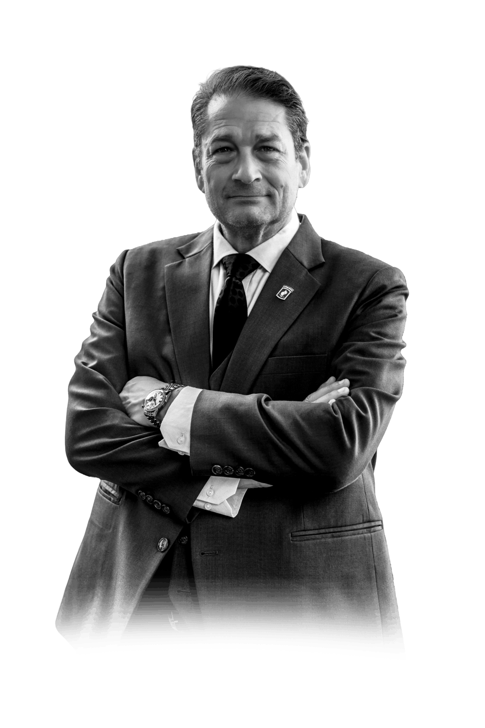 Black-and-white portrait of military defense attorney Will M. Helixon in a suit with arms crossed